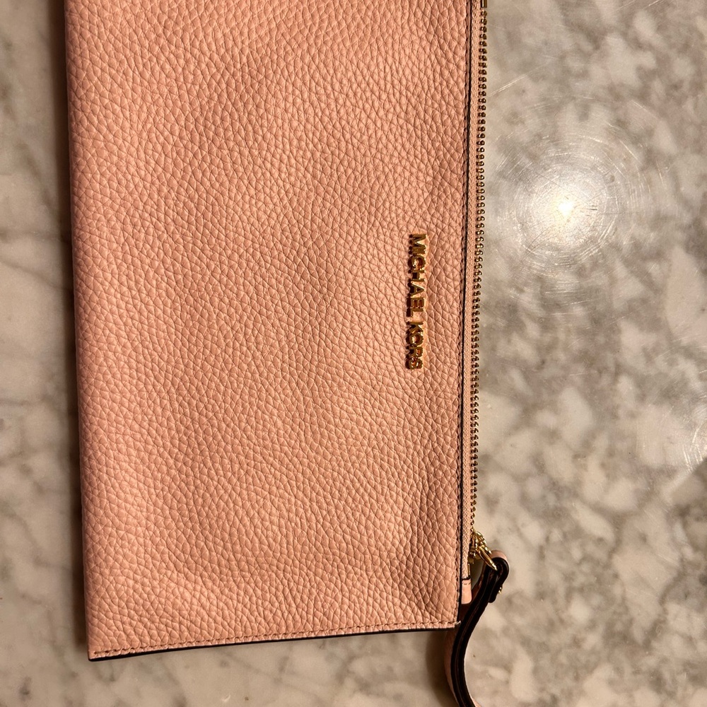Pink Michael Kors Wristlet.